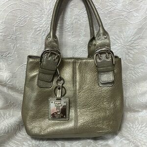Tignanello 1989 Gold Shoulder Bag with Pebbled Texture and Silver Buckle Accents